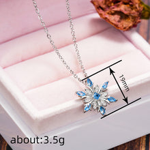 Blue Horse Eye Inlaid Snowflake Necklace